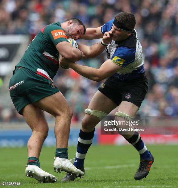 Ellis Genge of Leicester is tackled by Charlie Ewels during the Aviva Premiership match between Bath Rugby and Leicester Tigers at Twickenham Stadium...