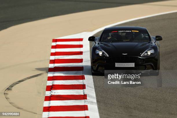 Geri Horner is driven by husband Red Bull Racing Team Principal Christian Horner in an Aston Martin Vanquish S as part of F1 Hotlaps before...