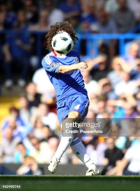 David Luiz of Chelsea in action during the Barclays Premier League match between Chelsea and Wigan Athletic at Stamford Bridge on April 9, 2011 in...
