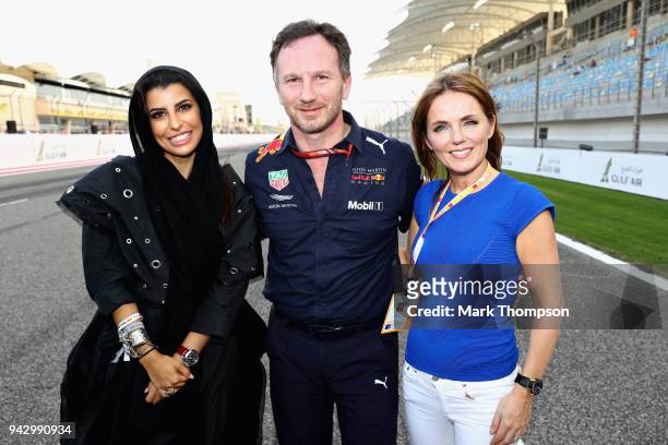 Geri Horner, Red Bull Racing Team Principal Christian Horner and Aseel Al Hamad pose for a photo after taking part in the F1 Hotlaps in an Aston...