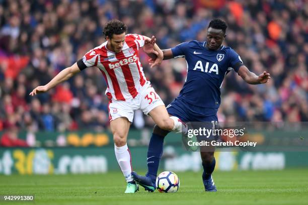 Ramadan Sobhi of Stoke City and Victor Wanyama of Tottenham Hotspur battle for the ball during the Premier League match between Stoke City and...