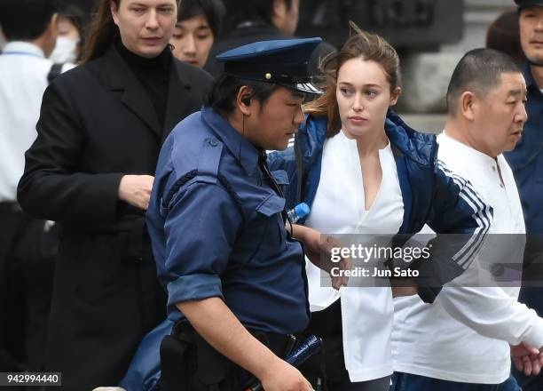 Alycia Debnam-Carey is seen filming on the streets of Nihonbashi on April 7, 2018 in Tokyo, Japan.