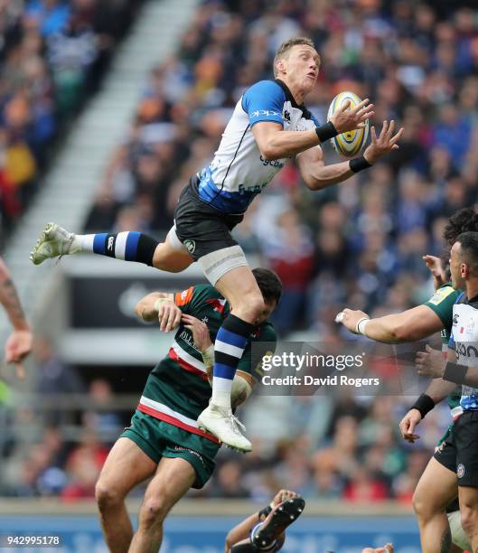 James Wilson of Bath is upended by Adam Thompstone during the Aviva Premiership match between Bath Rugby and Leicester Tigers at Twickenham Stadium...