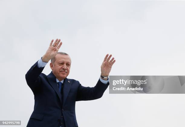 President of Turkey and leader of Turkey's ruling Justice and Development Party Recep Tayyip Erdogan greets the crowd ahead of the AK Party's 6th...