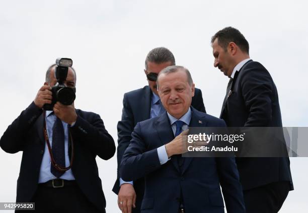 President of Turkey and leader of Turkey's ruling Justice and Development Party Recep Tayyip Erdogan greets the crowd ahead of the AK Party's 6th...