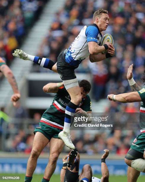 James Wilson of Bath is upended by Adam Thompstone during the Aviva Premiership match between Bath Rugby and Leicester Tigers at Twickenham Stadium...
