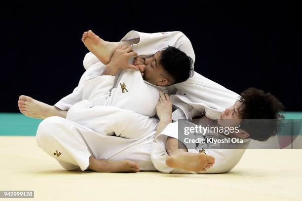 Tatsuya Komiyama competes against Rentaro Nogami in the Men's -73kg match on day one of the All Japan Judo Championships by Weight Category at...