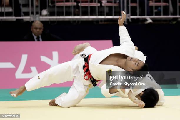 Soichi Hashimoto competes against Nobuyasu Takeuchi in the Men's -73kg match on day one of the All Japan Judo Championships by Weight Category at...