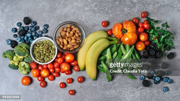 fresh vegetables, fruits, and nuts - frische stock-fotos und bilder