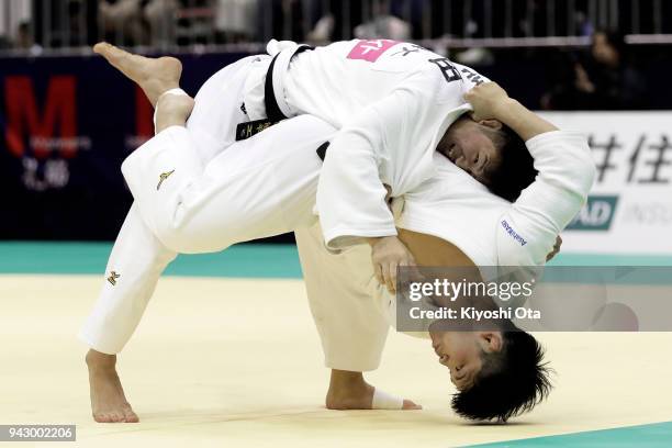Shohei Ono attempts to throw Yuhei Yoshida in the Men's -73kg match on day one of the All Japan Judo Championships by Weight Category at Fukuoka...