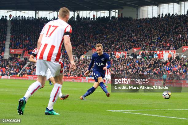 Christian Eriksen of Tottenham Hotspur scores the opening goal during the Premier League match between Stoke City and Tottenham Hotspur at Bet365...