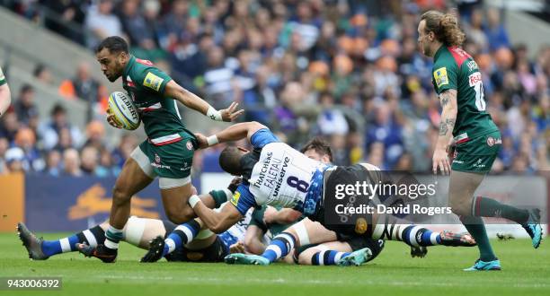 Telusa Veainu of Leicester moves past Taulupe Faletau during the Aviva Premiership match between Bath Rugby and Leicester Tigers at Twickenham...