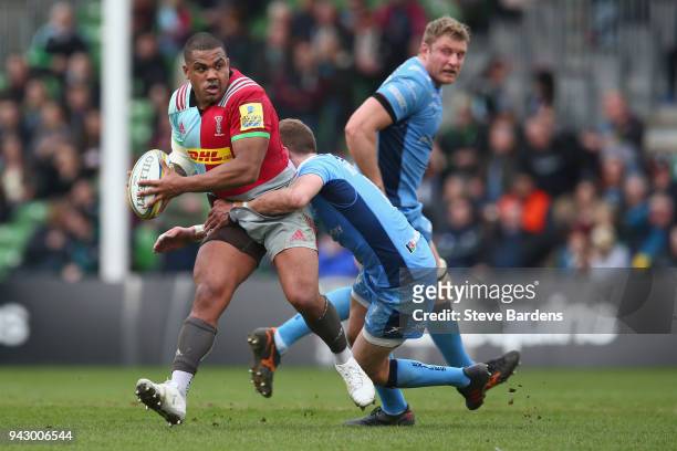 Kyle Sinckler of Harlequins is tackled by Johnny Williams of London Irish defence during the Aviva Premiership match between Harlequins and London...