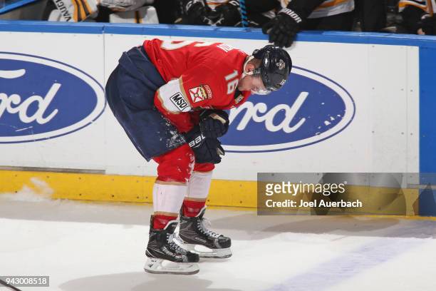 Aleksander Barkov of the Florida Panthers skates off the ice after being injured during third period action against the Boston Bruins at the BB&T...