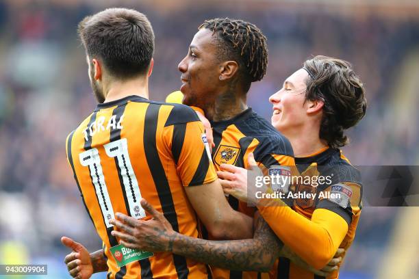 Jon Toral , Abel Hernández , and Harry Wilson of Hull City celebrate during the Sky Bet Championship match between Hull City and Queens Park Rangers...