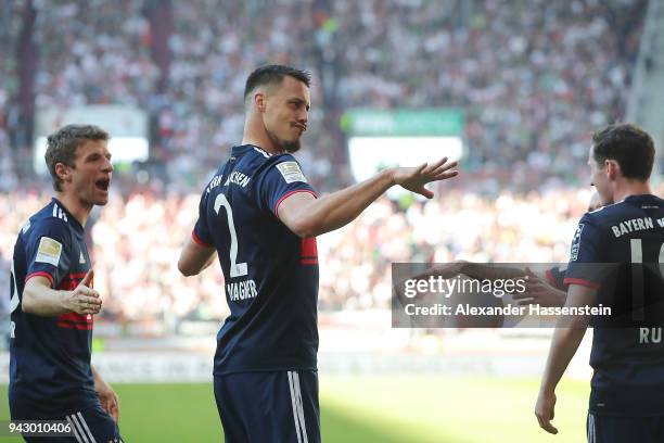 Sandro Wagner of Muenchen celebrates after he scored a goal to make it 1:4 during the Bundesliga match between FC Augsburg and FC Bayern Muenchen at...