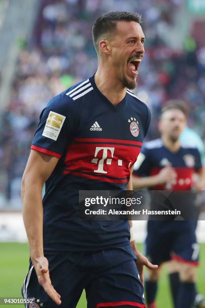 Sandro Wagner of Muenchen celebrates after he scored a goal to make it 1:4 during the Bundesliga match between FC Augsburg and FC Bayern Muenchen at...