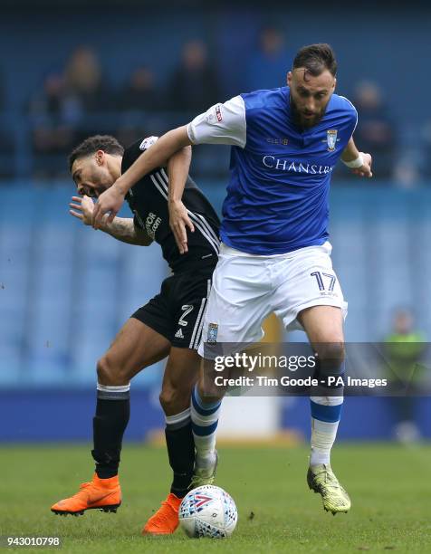 Fulham's Ryan Fredericks and Sheffield Wednesday's Atdhe Nuhiu battle for the ball during the Sky Bet Championship match at Hillsborough, Sheffield.