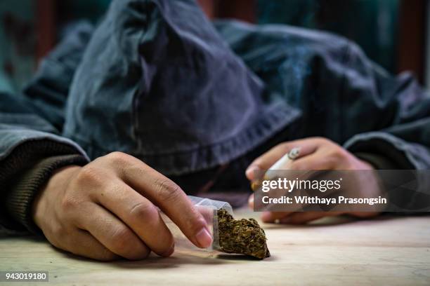 drunk cannabis drugs concept - drug addiction stock pictures, royalty-free photos & images