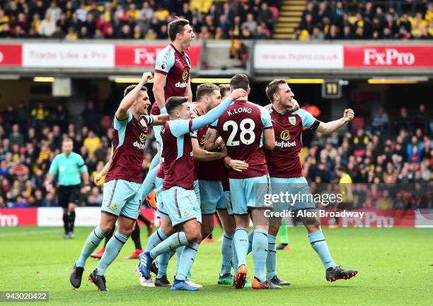 Burnley players celebrate their side's second goal during the Premier League match between Watford and Burnley at Vicarage Road on April 7, 2018 in...