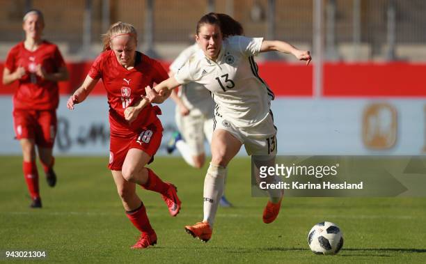 Sara Daebritz of Germany challenges Jika Chlastakova of Czech Republic during the 2019 FIFA Womens World Championship Qualifier match between Germany...