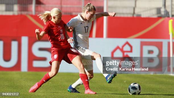 Verena Faisst of Germany challenges Katerina Svitkova of Czech Republic during the 2019 FIFA Womens World Championship Qualifier match between...