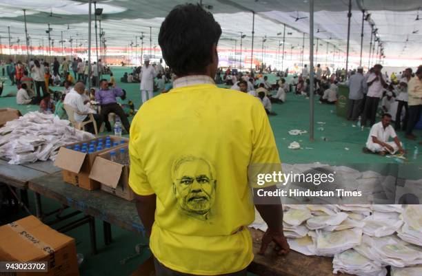 Free food stall for supporters and workers during the grand celebration of party's 38th foundation day, at BKC ground, on April 6, 2018 in Mumbai,...