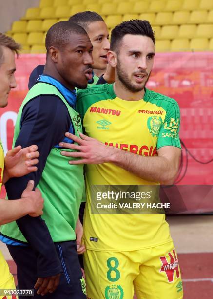 Nantes' French midfielder Adrien Thomasson celebrates after scoring a goal uring the French L1 football match Monaco vs Nantes on April 7, 2018 at...