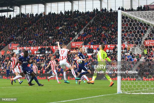 Harry Kane of Tottenham Hotspur scores their 2nd goal during the Premier League match between Stoke City and Tottenham Hotspur at Bet365 Stadium on...