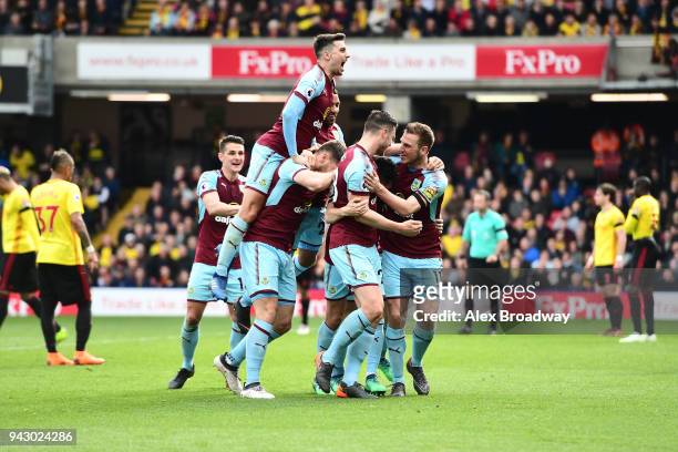 Burnley players celebrate their side's second goal during the Premier League match between Watford and Burnley at Vicarage Road on April 7, 2018 in...