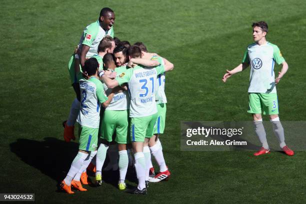 Daniel Didavi of Wolfsburg celebrates his team's first goal with team mates during the Bundesliga match between Sport-Club Freiburg and VfL Wolfsburg...