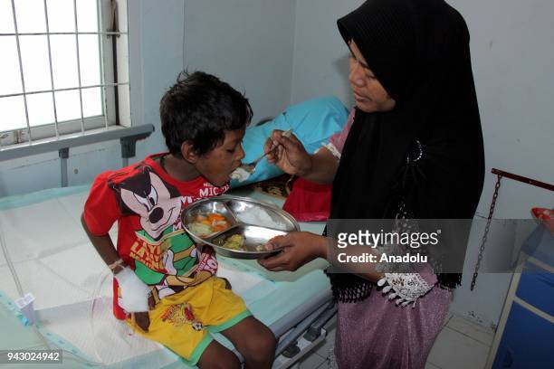 Kamal Husen takes medical treatment at Langsa General Hospital on April 7, 2018. Husen and two other Rohingyans have been dehydrated after having...