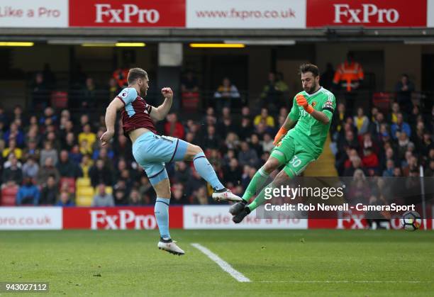 Burnley's Sam Vokes scores his side's first goal during the Premier League match between Watford and Burnley at Vicarage Road on April 7, 2018 in...