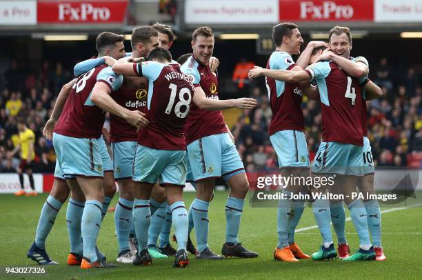 Burnley's Jack Cork celebrates with his team-mates after scoring his side's second goal of the game during the Premier League match at Vicarage Road,...