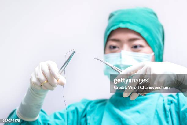 physician surgical - suture - fotografias e filmes do acervo