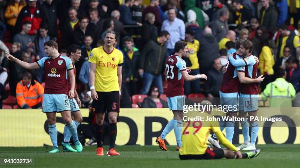 Burnley's Jeff Hendrick and his team-mates celebrate after the final whistle as Watford players look dejected following the Premier League match at...