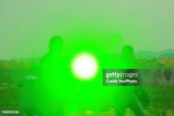 Palestinians protesters during clashes with Israeli toops near the border with Israel in the east of Jabaliya refugee camp in the northern Gaza...