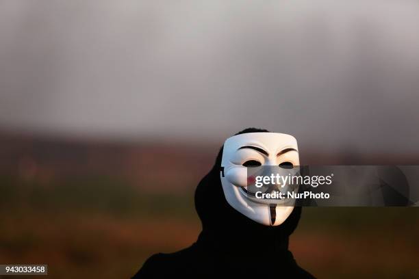 Palestinians protesters during clashes with Israeli toops near the border with Israel in the east of Jabaliya refugee camp in the northern Gaza...