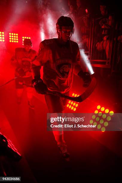 Maxim Mamin and teammate Jared McCann of the Florida Panthers head out to the ice for introductions prior to the start of the game against the Boston...