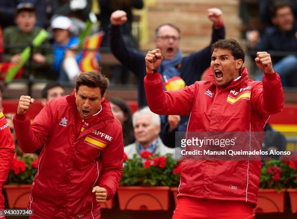 Rafael Nadal and David Ferrer of Spain celebrate a point during day two of the Davis Cup World Group Quarter Final match between Spain and Germany at...