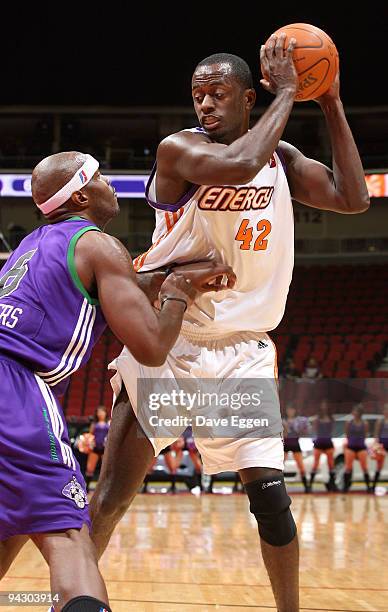 Earl Barron of the Iowa Energy looks to make a move against Curtis Withers of the Dakota Wizards in the first half of their NBA D-League game...