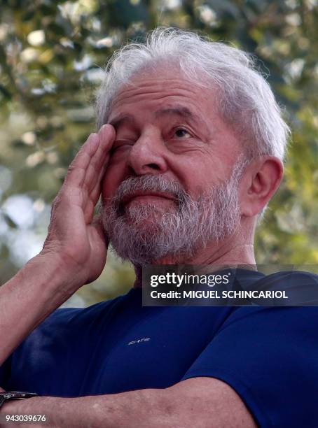 Brazilian ex-president Luiz Inacio Lula da Silva gestures during a Catholic mass in memory of his late wife Marisa Leticia, at the metalworkers'...