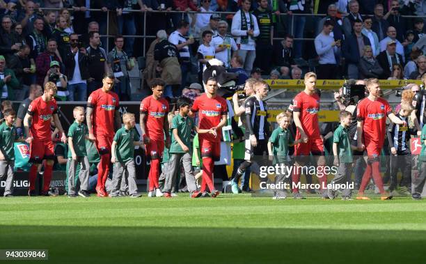 Fabian Lustenberger, Davie Selke, Valentino Lazaro, Karim Rekik, Arne Maier and Mitchell Weiser of Hertha BSC before the Bundesliga game between...
