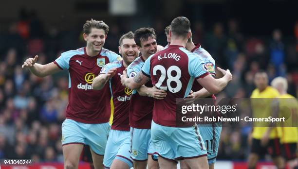 Burnley's Jack Cork is congratulated after scoring his side's second goal during the Premier League match between Watford and Burnley at Vicarage...