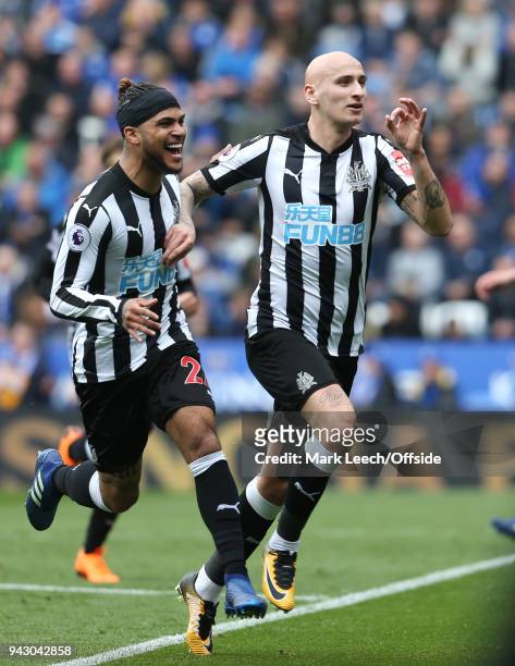 DeAndre Yedlin of Newcastle celebrates the opening goal with scorer, Jonjo Shelvey of Newcastle, during the Premier League match between Leicester...