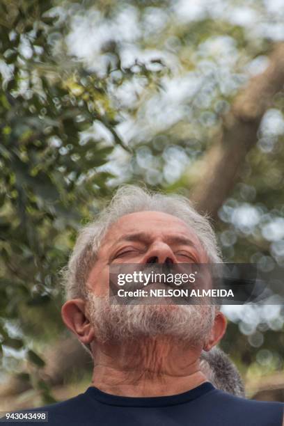 Brazilian ex-president Luiz Inacio Lula da Silva gestures during a Catholic mass in memory of his late wife Marisa Leticia, at the metalworkers'...