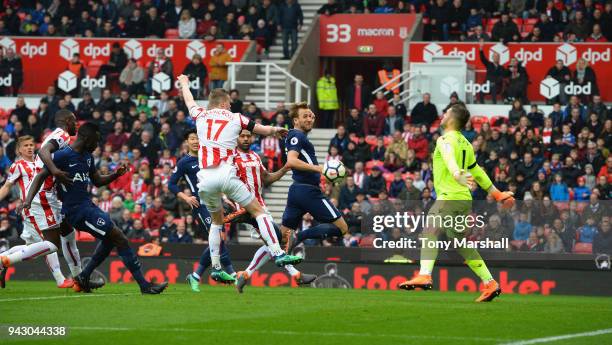 Harry Kane of Tottenham Hotspur scores their second goal during the Premier League match between Stoke City and Tottenham Hotspur at Bet365 Stadium...