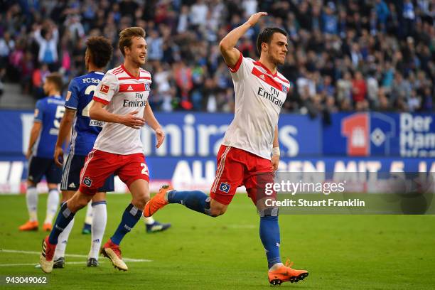 Filip Kostic of Hamburg celebrates after he scored a goal to make it 1:1 during the Bundesliga match between Hamburger SV and FC Schalke 04 at...