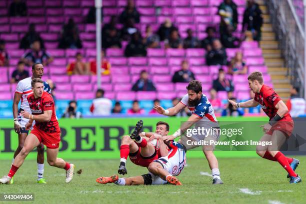 Morgan Williams of Wales fights with Martin Iosefo of USA during the HSBC Hong Kong Sevens 2018 match between USA and Wales on April 7, 2018 in Hong...