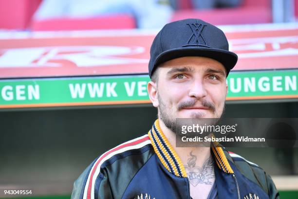 Konstantinos Stafylidis of Augsburg looks on prior to the Bundesliga match between FC Augsburg and FC Bayern Muenchen at WWK-Arena on April 7, 2018...